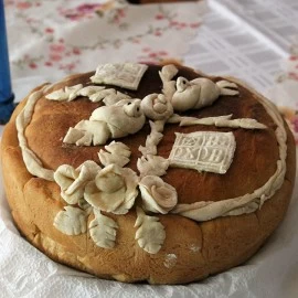 ŠTA SIMBOLIZUJU UKRASI NA SLAVSKOM KOLAČU?